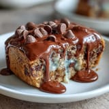 1. Chewy Cadbury Egg blondies with white chocolate drizzle, packed with colorful Mini Eggs and perfect for Easter dessert platters.  