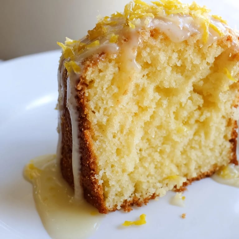 Freshly baked Lemon Pound Cake, dense and moist, is perfect for a comforting afternoon treat.
